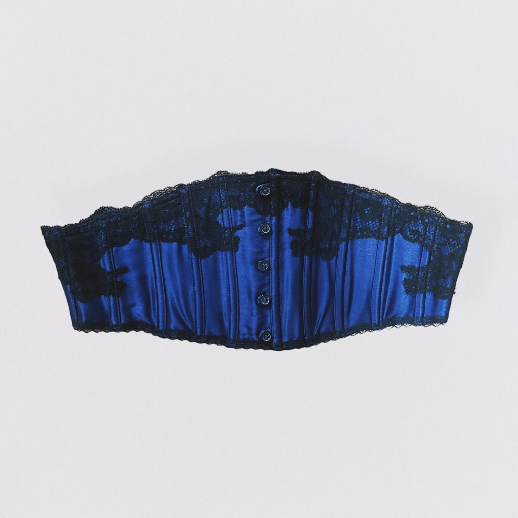 CHANTAL THOMASS – dark blue satin waist belt with black lace details