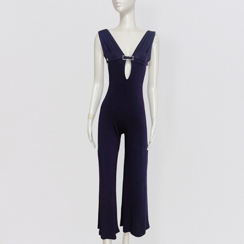 PACO RABANNE – Plum jumpsuit with deep neckline, flared legs and rhinestone detail