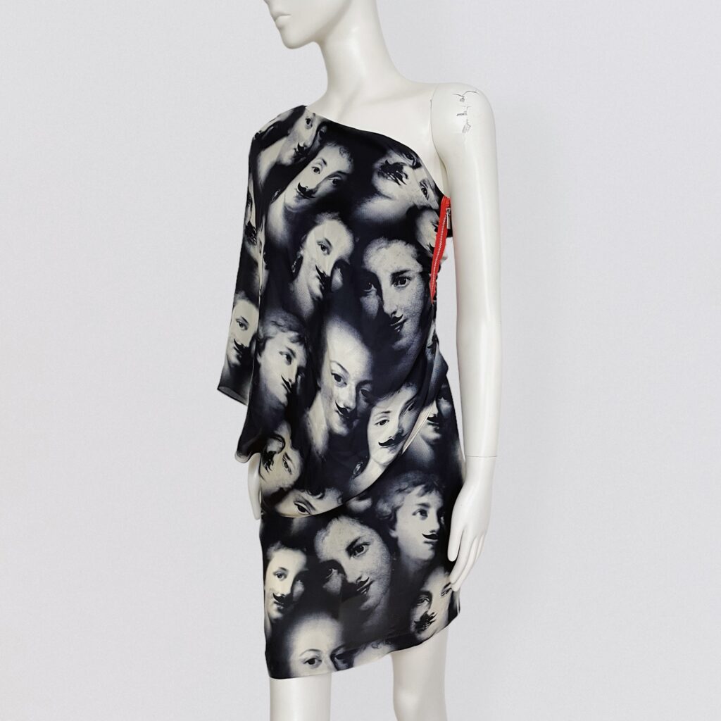 JC DE CASTELBAJAC – F/W 2011 mini one shoulder silk dress with black and white faces print and red side zipper