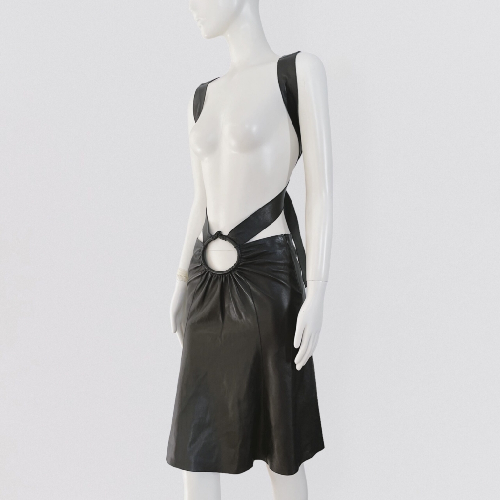 JUNKO SHIMADA – S/S 2004 Black lambskin midi skirt with XL strap and round navel cutout