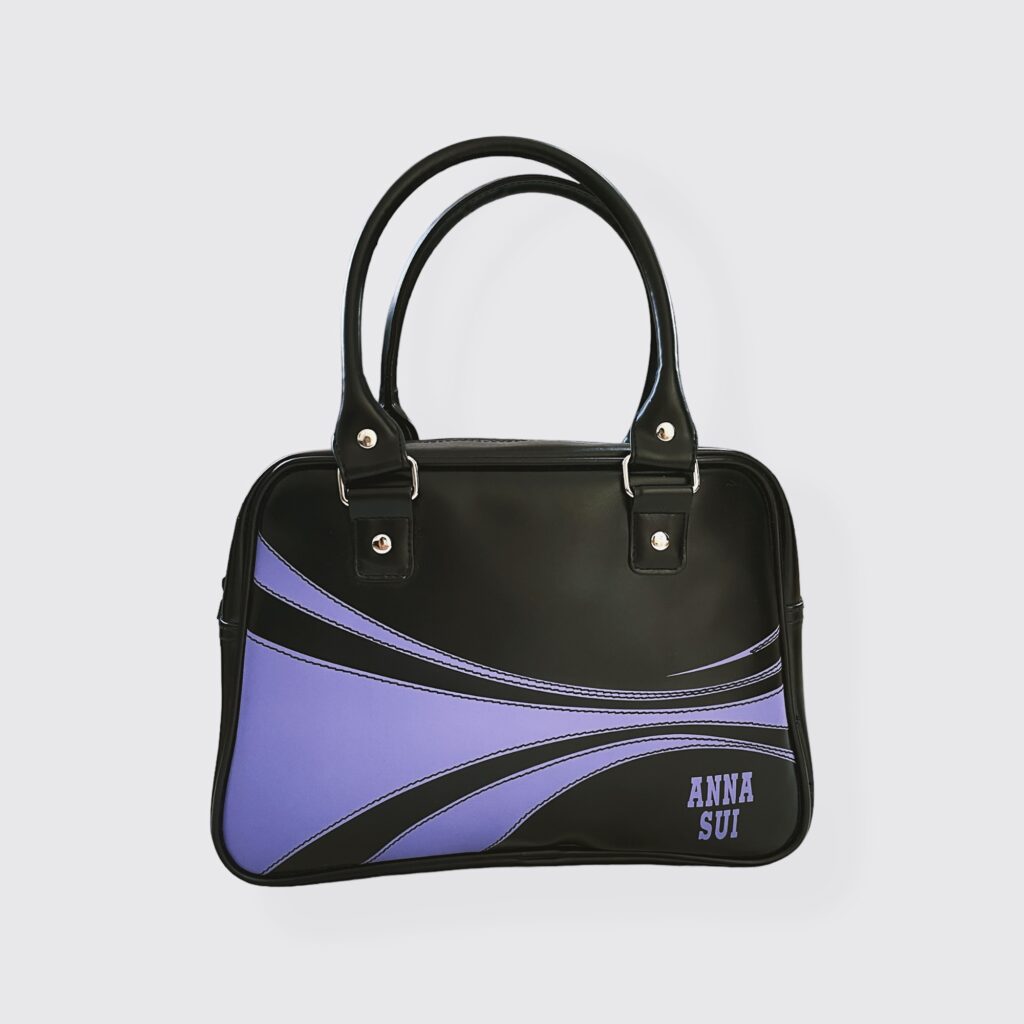 ANNA SUI – Black and purple leather rectangular bowling bag
