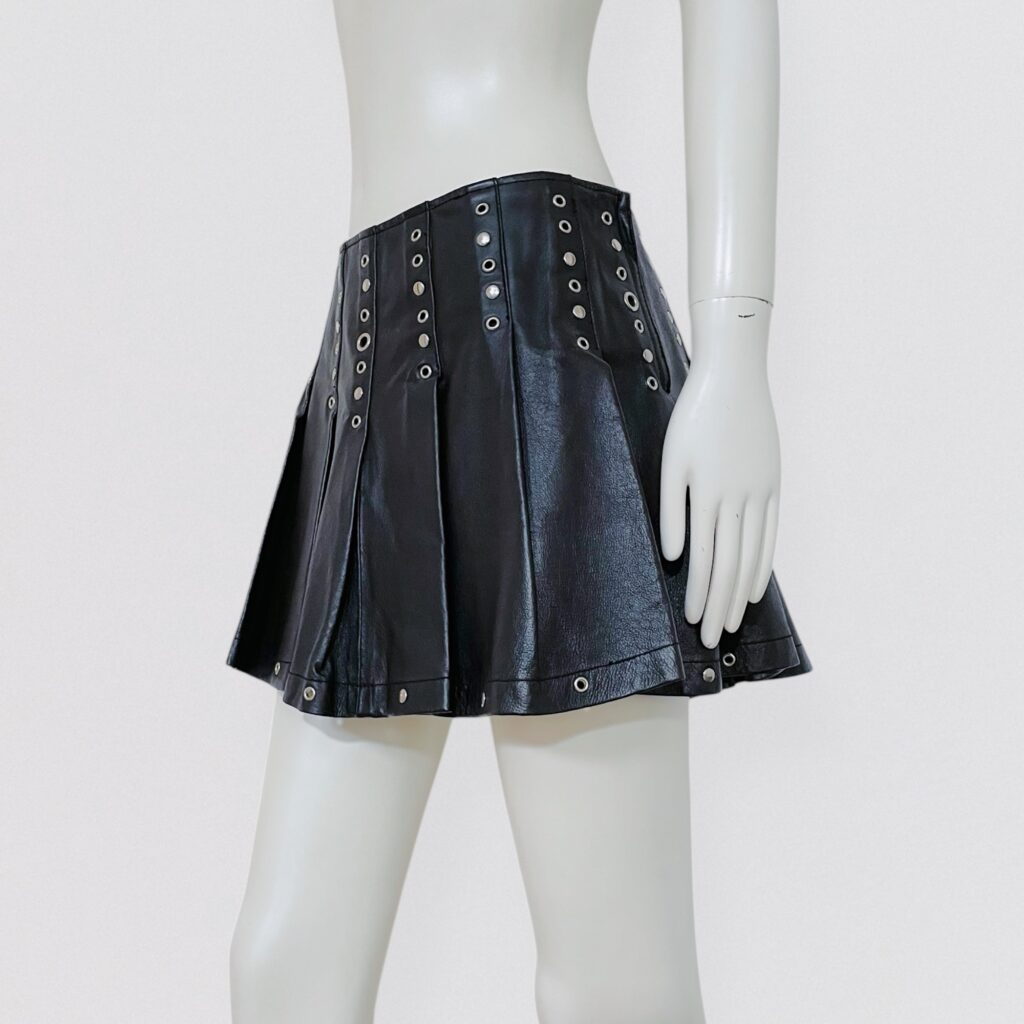RINASCIMENTO – black pleated leather mini skirt with silver studs